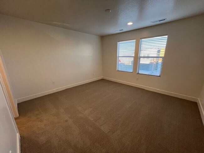 Building Photo - BRAND NEW South Desert Townhome with EVSE Outlet