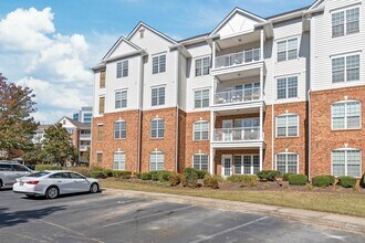 Building Photo - Prime Ballantyne Living: 2-Bedroom, 2-Bath Condo