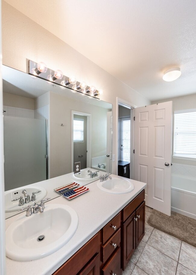 Building Photo - Downtown 3 Bedroom Townhome with 2 Car Garage