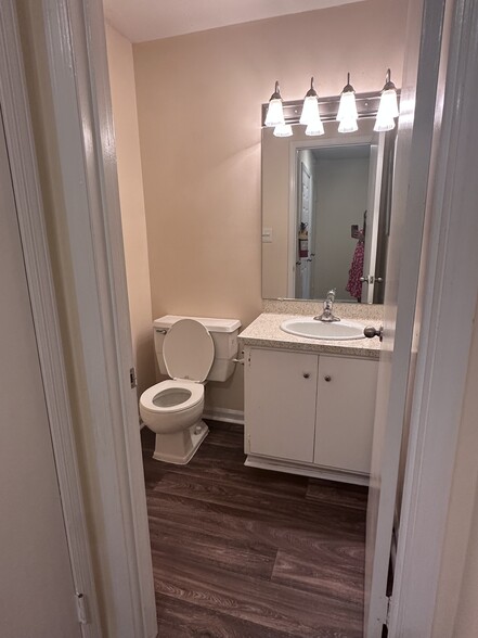 Downstairs Half Bathroom - Woodville Apartments
