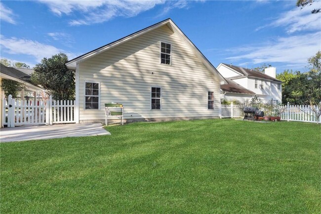 Building Photo - 4-Bedroom Home in Wild Heron with Front Porch and Fenced Yard
