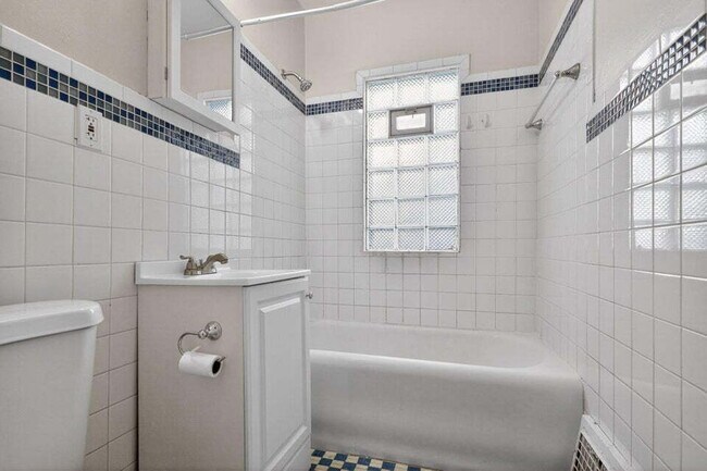 Building Photo - Spacious four bedroom home, available late June.