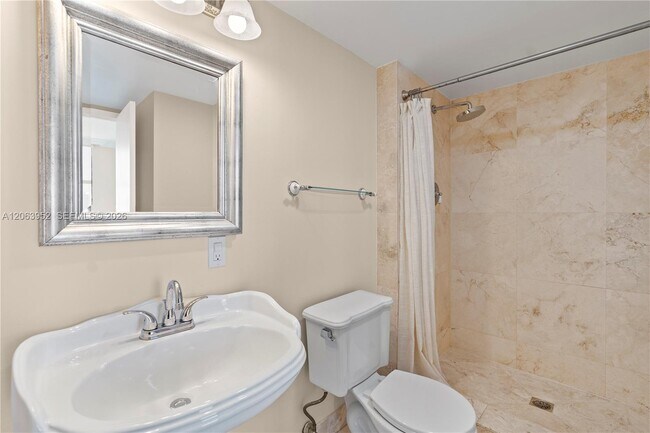 Building Photo - 3675 N Country Club Dr