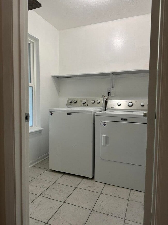 Building Photo - Move-In Ready Corner-Lot Home with Wraparound Porch Near Fort Eisenhower