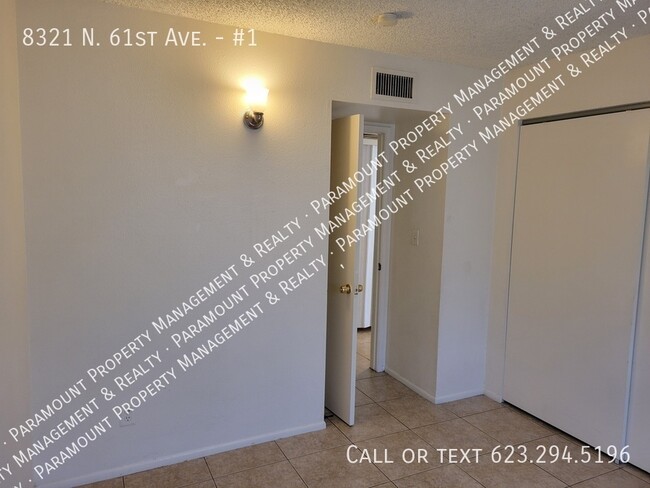 Building Photo - 8321 N 61st Ave