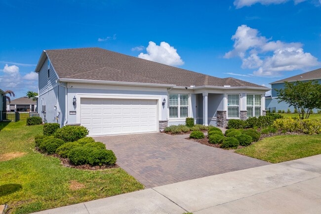 Building Photo - Immaculate Executive Home in Isles of Lake Nona