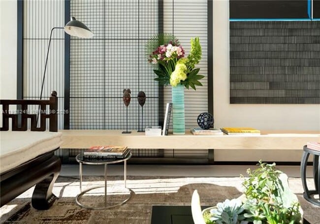 Building Photo - 10201 Collins Ave