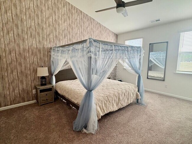 Building Photo - Scenic 3-Bed Townhome with Screened Porch, First Floor Storage & 1-Car Garage – Overlooking the G...