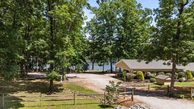 Building Photo - This FULLY FURNISHED ALL INCLUSVIE HOME IS...