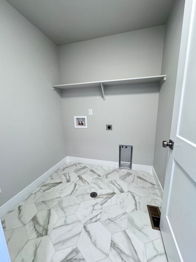 Building Photo - Sage Meadows II Townhomes — Lakeside Living Meets Modern Comfort!