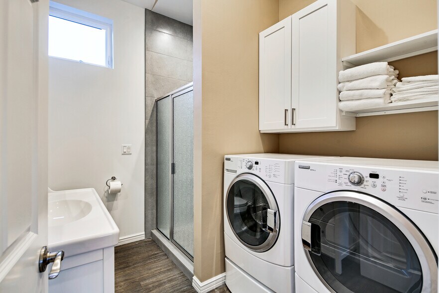 Full size washer/dryer in bathroom with walk-in shower - 2732 44th Ave SW