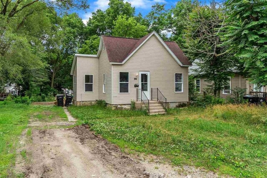 Cute house set back off of street. Plenty of windows for natural light. - 756 W Grand Ave