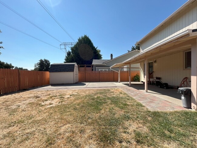 Building Photo - Spacious 4-Bedroom, 2.5-Bathroom Home with...