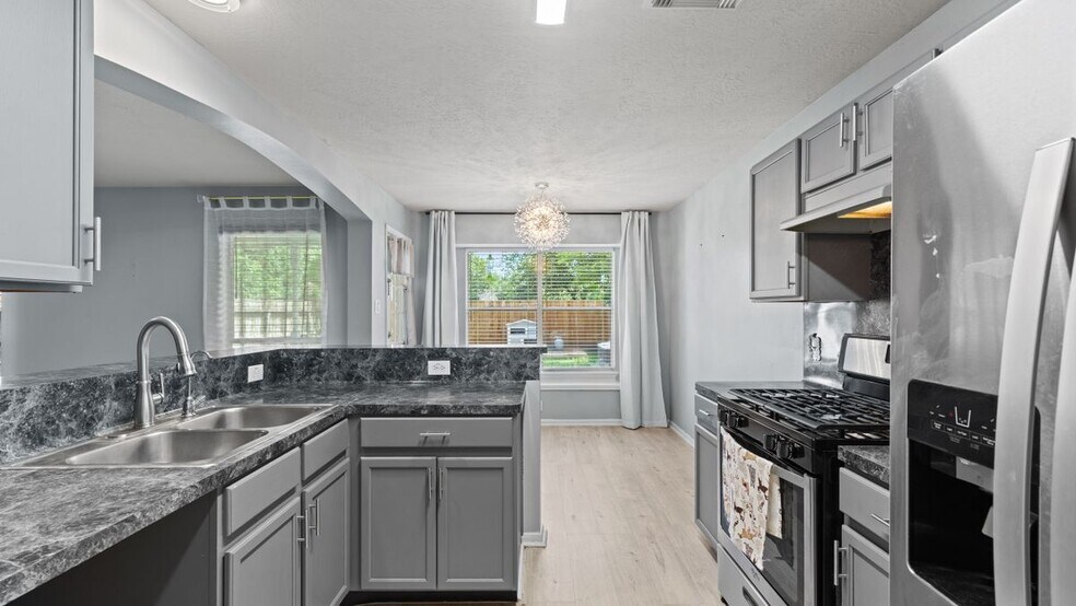 Building Photo - 8219 Fuqua Gardens Dr