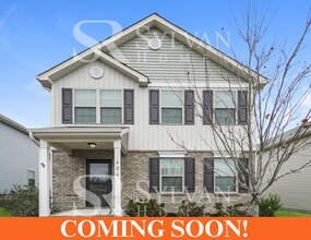 Building Photo - Come view this charming home