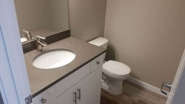Building Photo - Beautifully updated town home with fenced backyard.