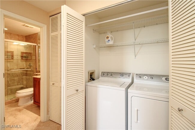 Building Photo - 7024 Pelican Bay Blvd