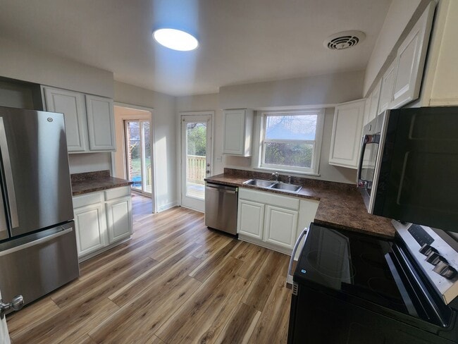 Building Photo - Newly updated 3 bedroom 1.5 bath home for rent with partial finished basement with additional bed...