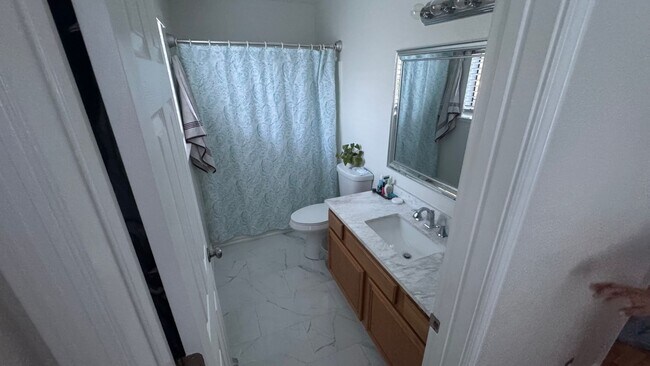 Building Photo - 4bed/2bath/2car garage. RV parking & massive landscaped backyard in cut-de-sac