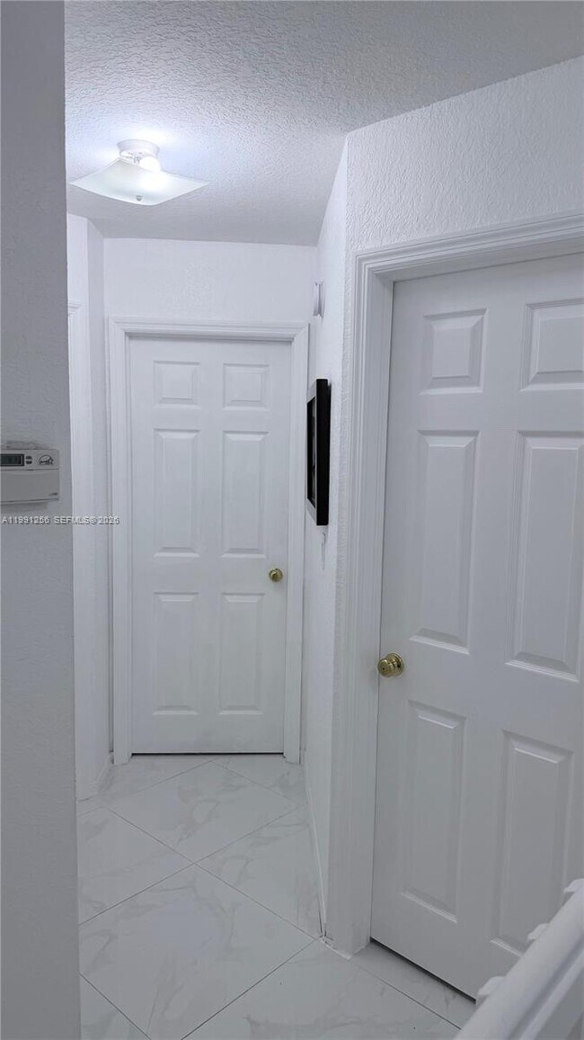 Building Photo - 5785 NW 116th Ave