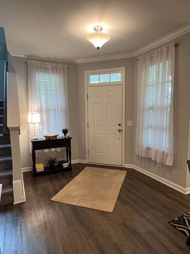 Building Photo - FURNISHED Three Bedroom Wellstone Model Home