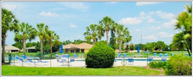 Building Photo - **SUNCOAST LAKES GATED COMMUNITY**