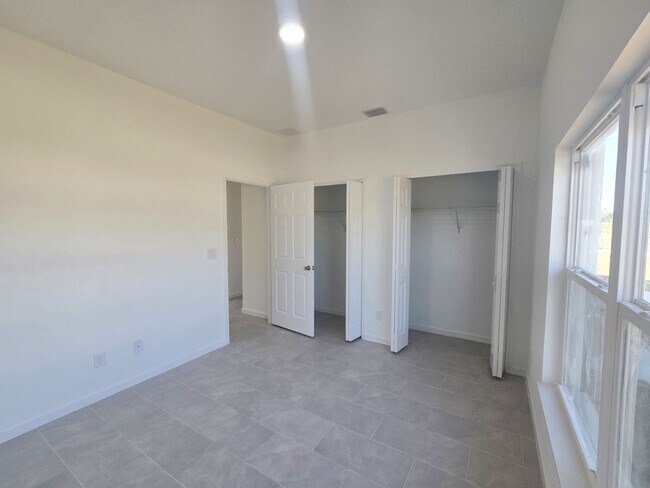 Building Photo - Brand New 2/2/1-PRIME SW LOCATION - Lehigh Acres