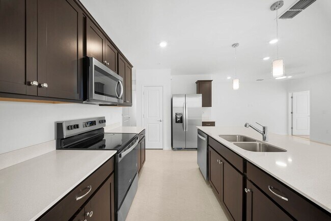 Building Photo - Newly constructed property offers four spacious bedrooms, two full bath in Lehigh Acres