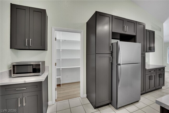 Building Photo - 7595 W Camero Ave