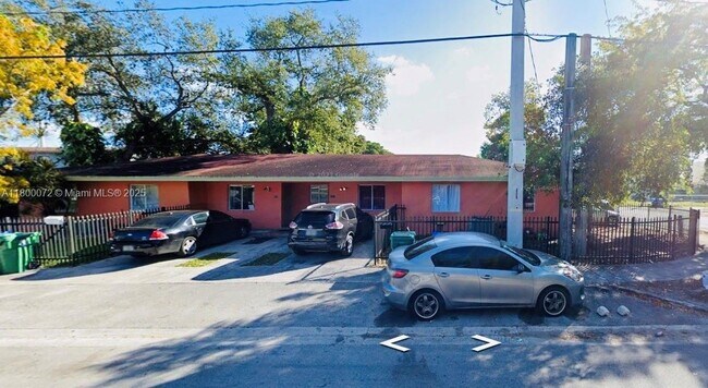 Building Photo - 5857 NW 13th Ave
