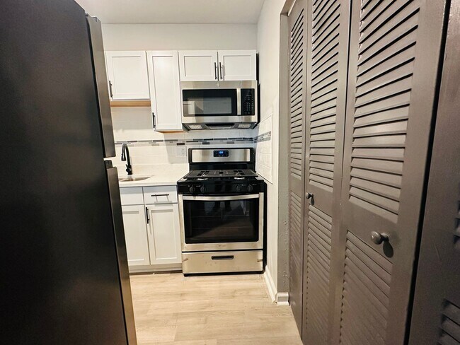 Building Photo - Experience Luxury Living at Bellagio Livin...