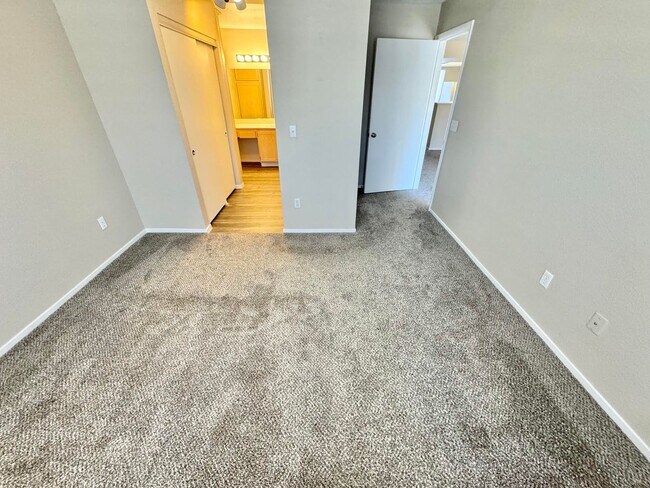 Building Photo - Bright and airy 2-bedroom, 2-bathroom second-floor condo tucked inside a secure gated community i...