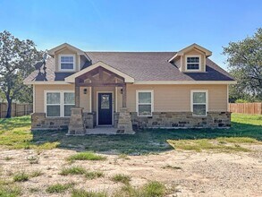 Building Photo - Elegant Stone-Front Home on 1 Acre in Natalia
