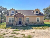 Building Photo - Elegant Stone-Front Home on 1 Acre in Natalia
