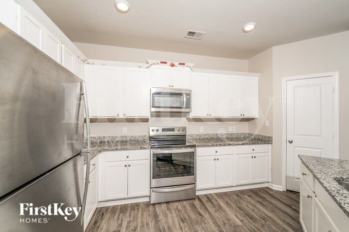 Building Photo - 6986 Rebecca Ln