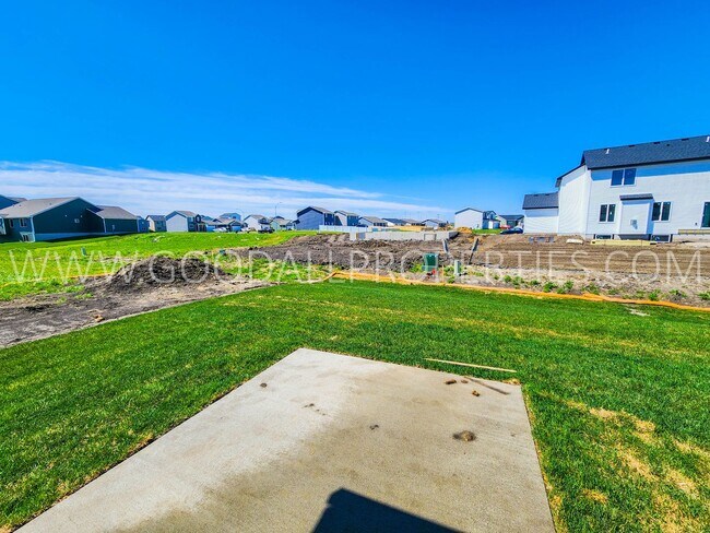 Building Photo - Spacious Waukee Ranch | 4 Bedrooms | 3-Car Garage | Finished Basement