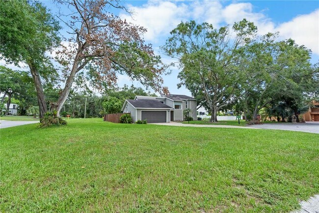 Building Photo - 7815 N River Shore Dr