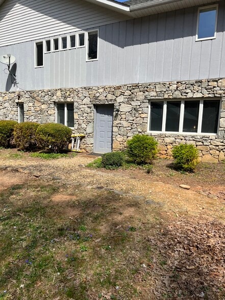 Private entrance to lower level with separate parking and two large spaces for Gardens - 45 Pentland Hills Dr