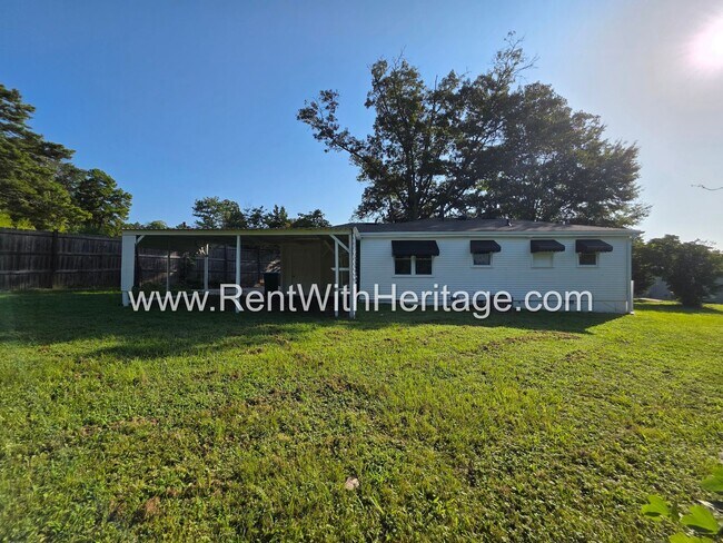 Building Photo - 5990 Peco Ln