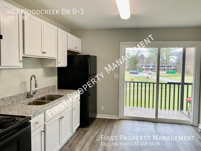 Building Photo - 403 Woodcreek Dr