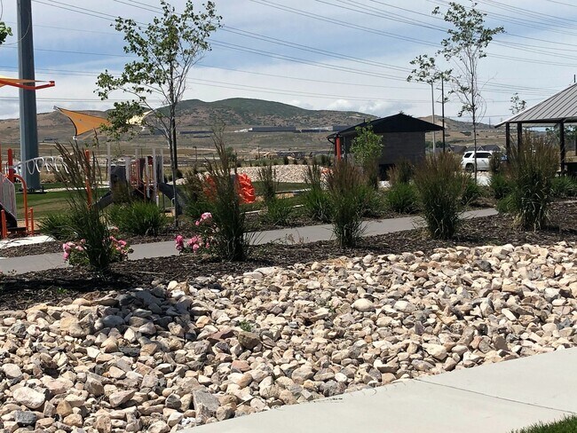 Building Photo - AMAZING HOME IN SOUGHT AFTER EXCHANGE DEVELOPMENT W/ 2 CAR GARAGE