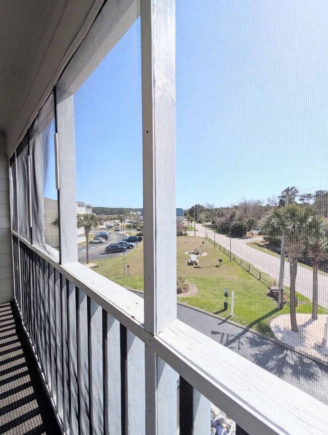 Building Photo - Dreamy Little River Condo — Furnished, Elevator Access, Pool & Marina Nearby!