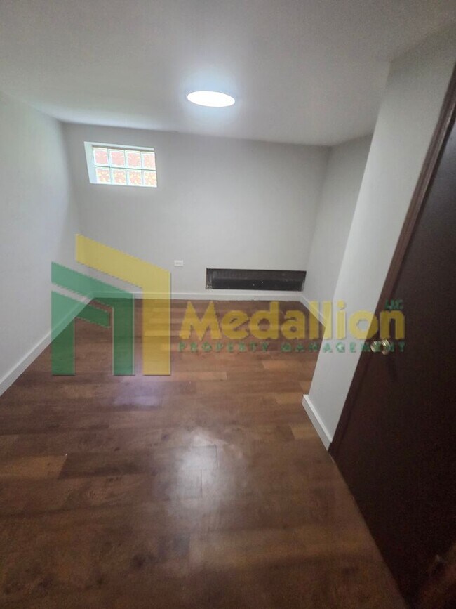 Building Photo - Spacious 6-Bedroom Home with Finished Basement and Backyard