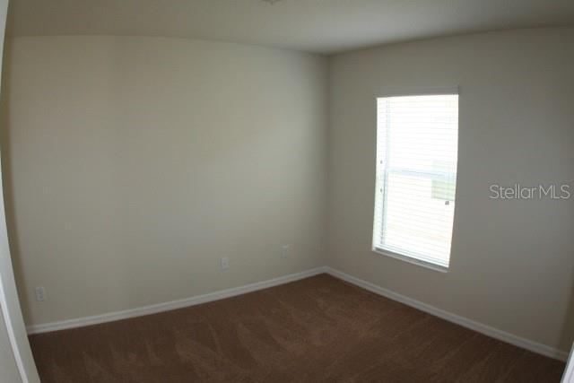 Building Photo - 15566 Sword Lily Pl