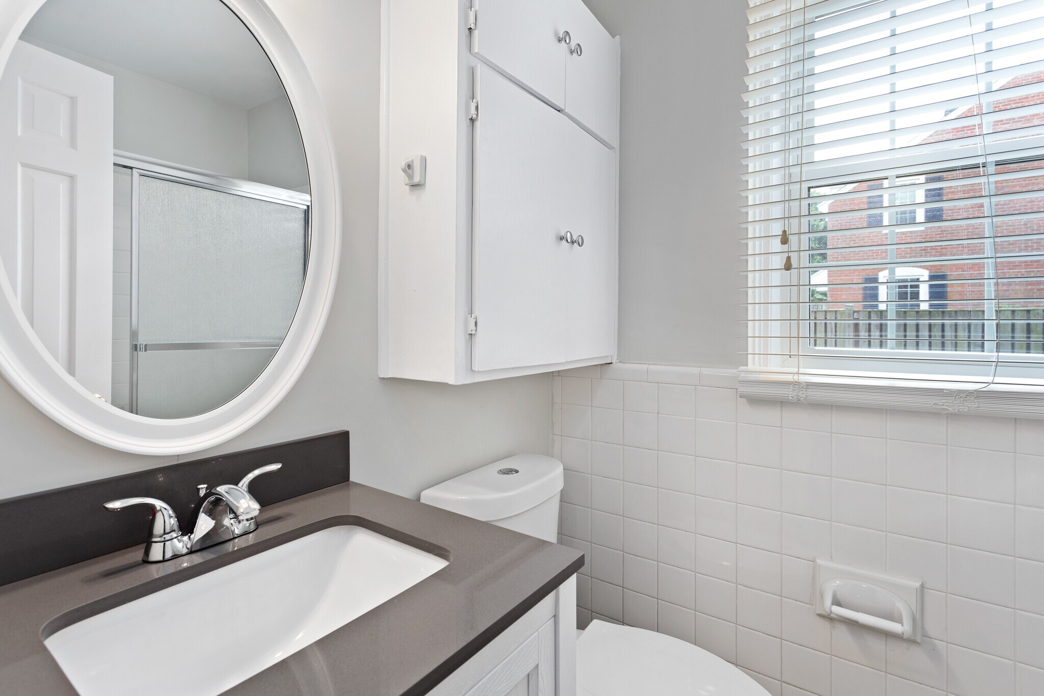 Main floor bath with updated sink vanity - 4218 35th St S