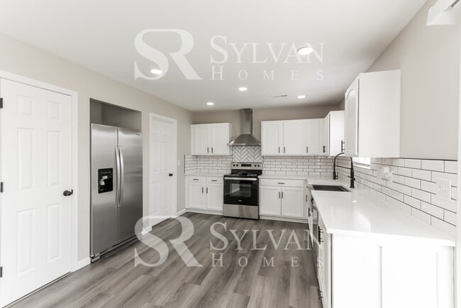 Building Photo - Enjoy living the good life in this 4 bedro...
