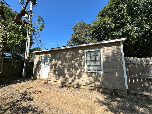 Building Photo - Charming 3BR/2BA Near Southwind | Hardwood Floors, Brick Fireplace, Bay Window & 2-Car Garage