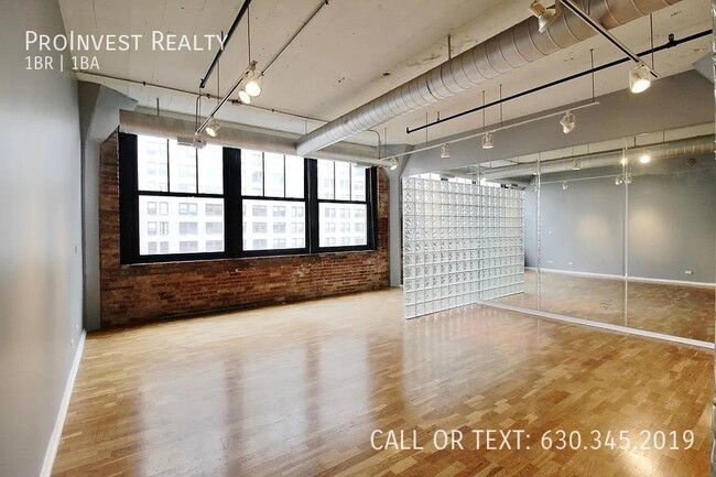 Building Photo - Available Now! Sprawling Sun-drenched 1Bed...