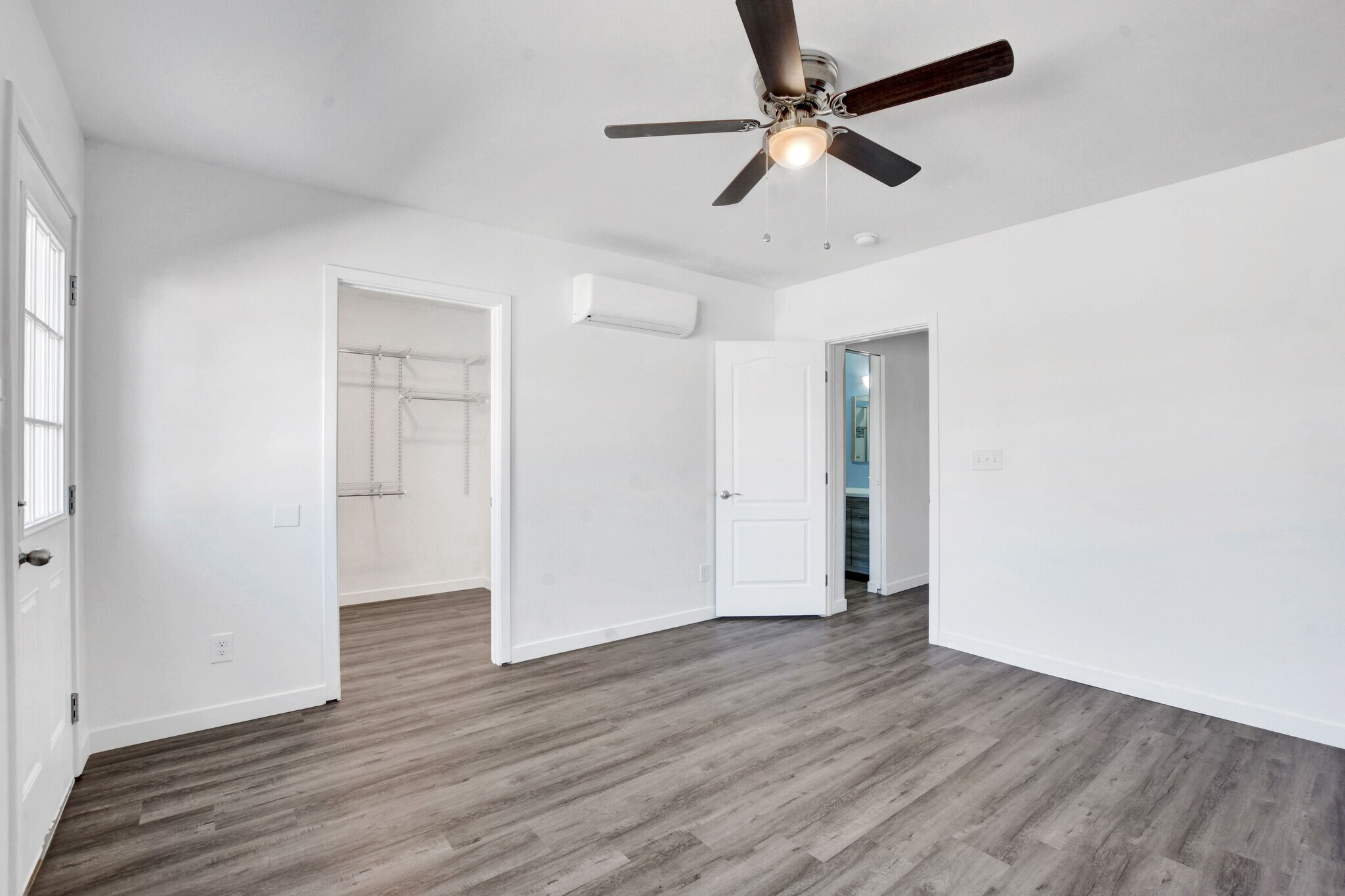 master bedroom and entry into seperate laundry room and walk-in closet - 1774 Willow Trl