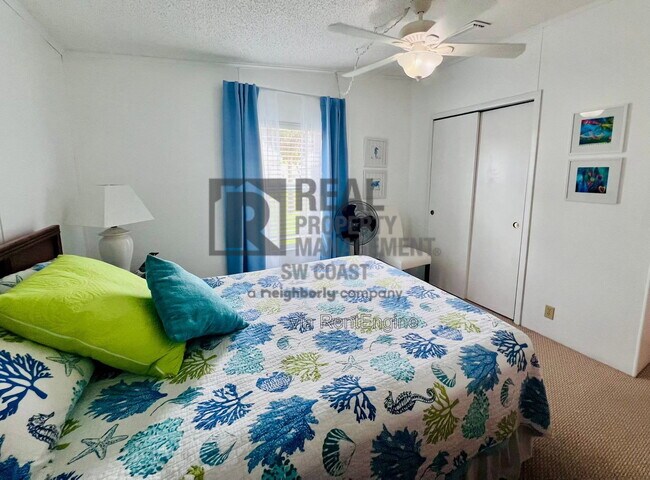 Building Photo - 202 Fan Palm Ln